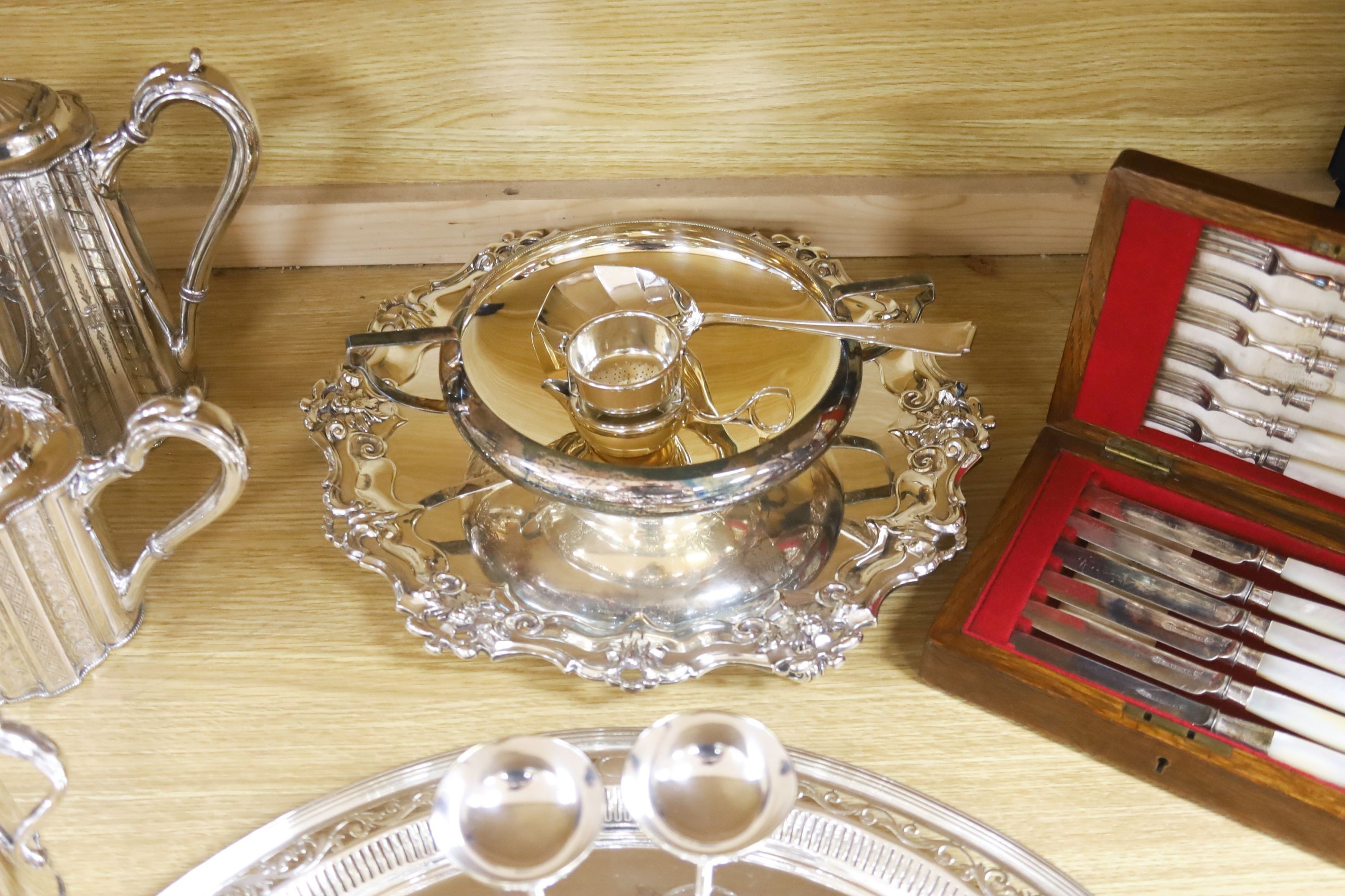 A Victorian cut glass and electroplate biscuit box and other plated wares